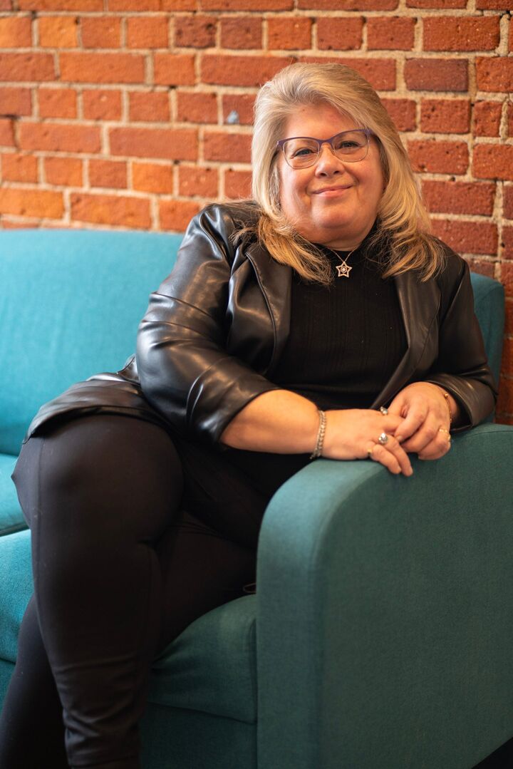 Headshot Couch Masiello Dover Office